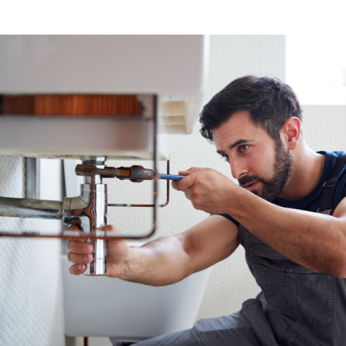 3 children sitting on gray couch