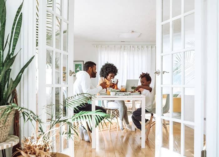 man writing on paper